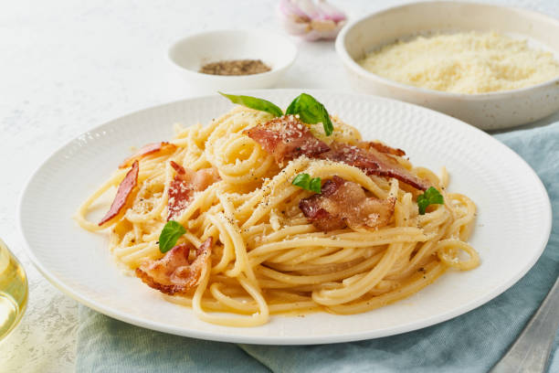 Carbonara pasta. Spaghetti with pancetta, egg, parmesan cheese and cream sauce stock photo