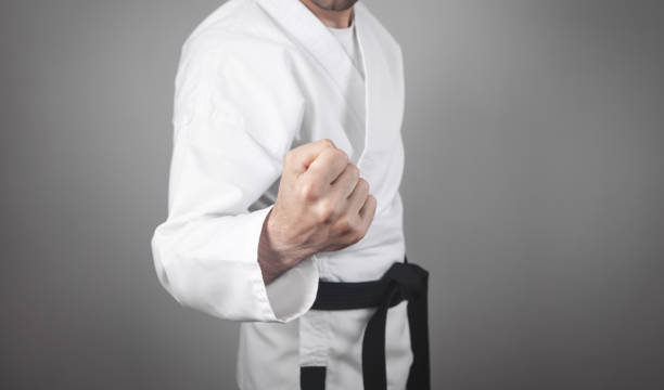 istock Caucasian male punch. Doing karate. Martial arts 1266217809