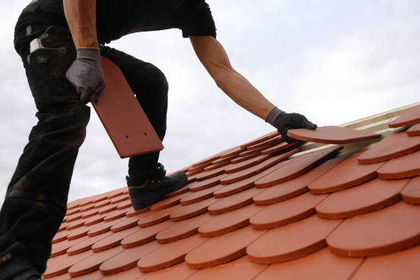 istock Roofing work, new covering of a tiled roof 1266219437