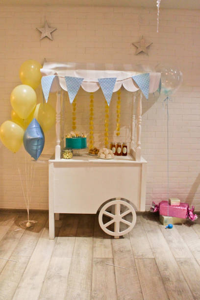 istock Festive table for children, cake, sweets, food 1266220865