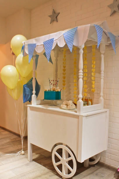 istock Festive table for children, cake, sweets, food 1266220876