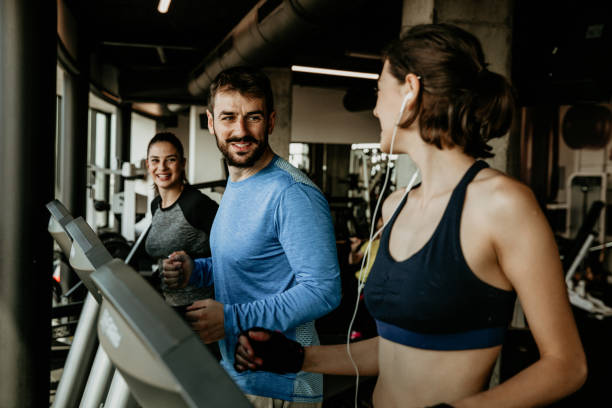 istock Group of fit people on a treadmill 1266224608