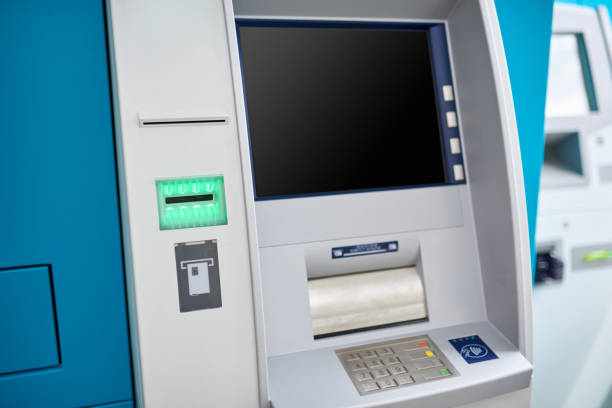 istock ATM cash machine, operating and functional, no people around 1266224967