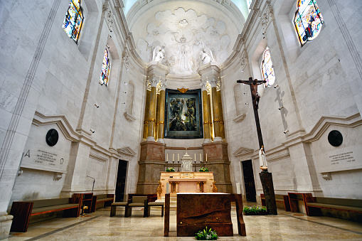 panorama. interior of a Catholic cathedral with benches. traditions and religious service. tourist places.