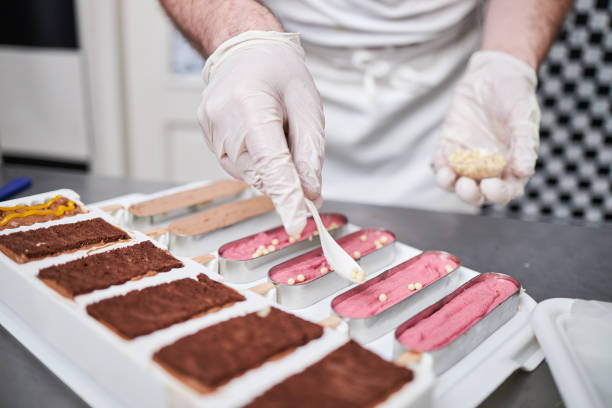 istock Chef decorating molded ice cream cookies 1266230781