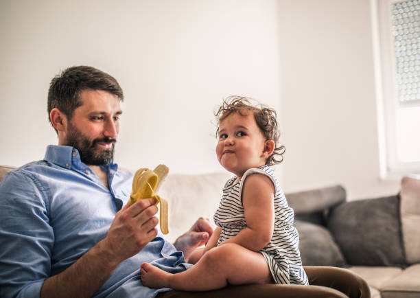 istock A father plays with his baby daughter in quarantine 1266237623