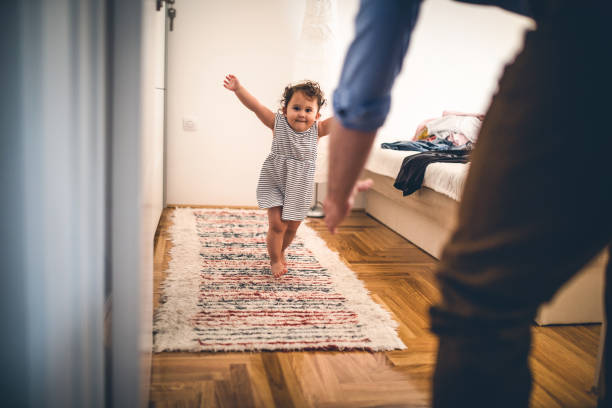 istock A father plays with his baby daughter in quarantine 1266237660