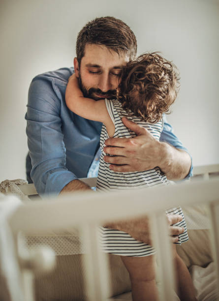 istock A father plays with his baby daughter in quarantine 1266242126