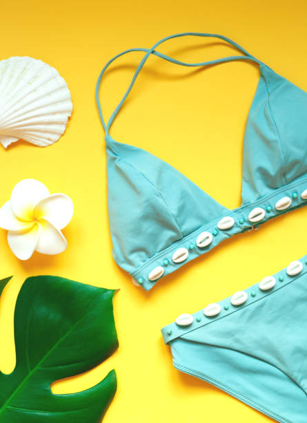 istock set of summer beach accessories on a yellow background 1266246101