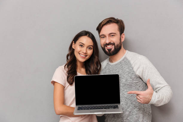 istock Portrait of a smiling young couple 1266248794