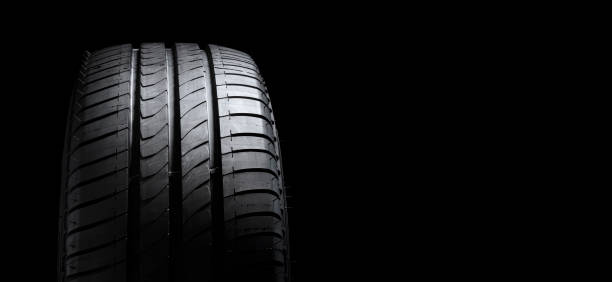 istock Tire ot tyre profile on black background with copy space 1266251061