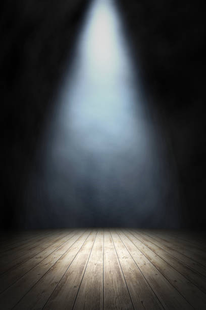 istock Empty stand up scene with wooden floor and spot lights.. Empty room studio gradient used for background and display your product. 3d illustration 1266251804