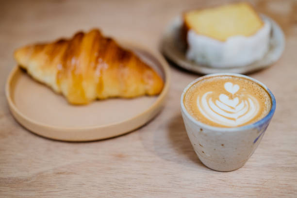 istock Coffee and desserts on top of table 1266255033
