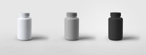 istock Mockup of a white, gray, black plastic jar standing on the background, for design presentation, advertising of tablets, vitamins. 1266257520