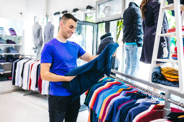 istock Man in clothing store 1266258166
