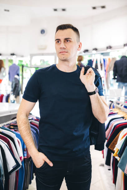 istock Man in clothing store 1266258207