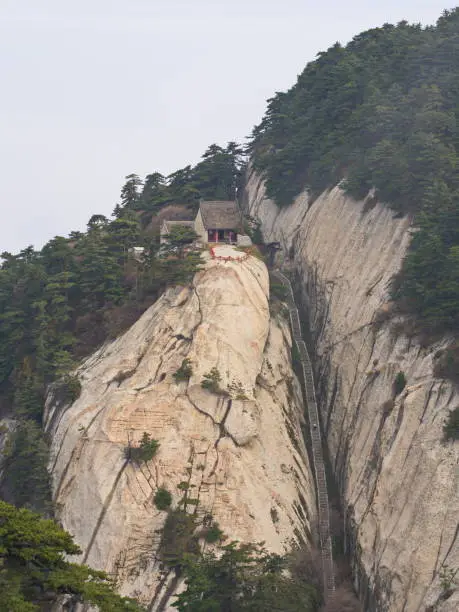 Photo of Huashan Mountain near Xian City. The Most dangerous Trail and Crowned People in China. Mount Hua is one of the Five Great Mountains of China in Huayin City, Shaanxi Province, China, 18th October 2018