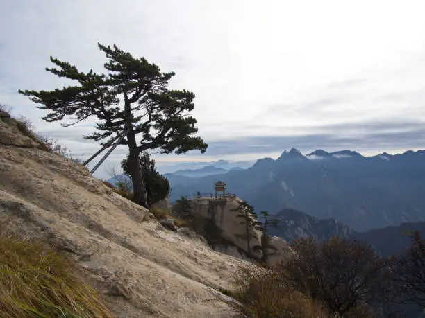 Photo of Huashan Mountain near Xian City. The Most dangerous Trail and Crowned People in China. Mount Hua is one of the Five Great Mountains of China in Huayin City, Shaanxi Province, China, 18th October 2018