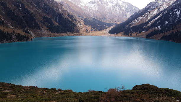 istock Big Almaty Lake, Kazakhstan 1266262307