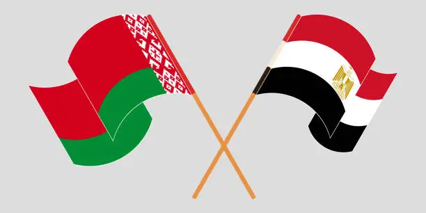 Vector illustration of Crossed and waving flags of Egypt and Belarus