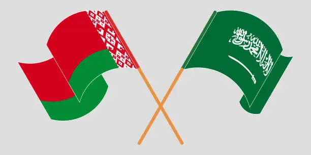 Vector illustration of Crossed and waving flags of Belarus and the Kingdom of Saudi Arabia