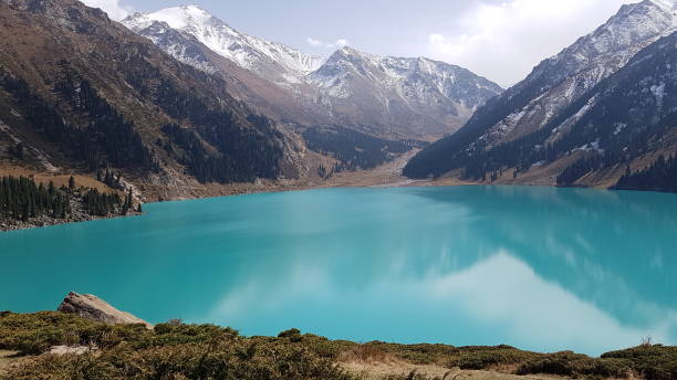 istock Big Almaty Lake, Kazakhstan 1266262893