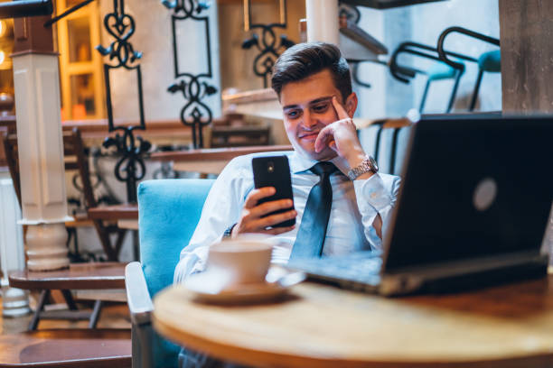 istock Businessman resting in cafe 1266266602
