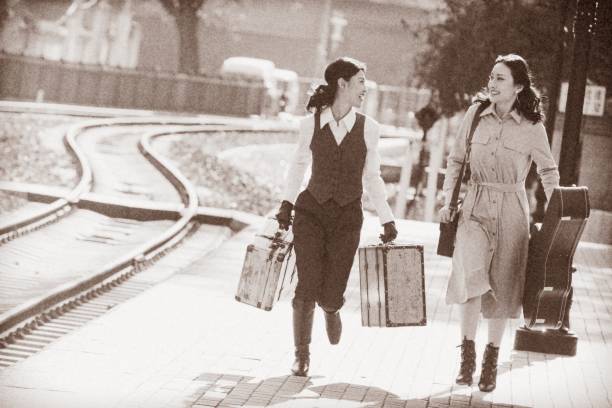 Young girlfriends with luggage to travel