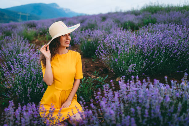 istock Young joyful woman in lavender field 1266269172