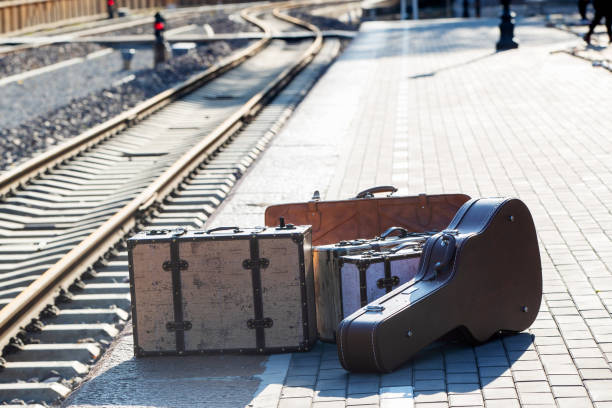 Suitcases next to the tracks