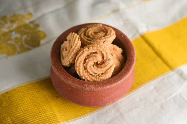 istock Rice Murukku or Chakli Indian deep fried snack Kerala Onam 1266271248