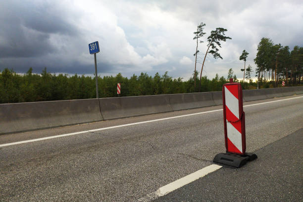istock broken road sign on an empty track on a curtain day 1266272982