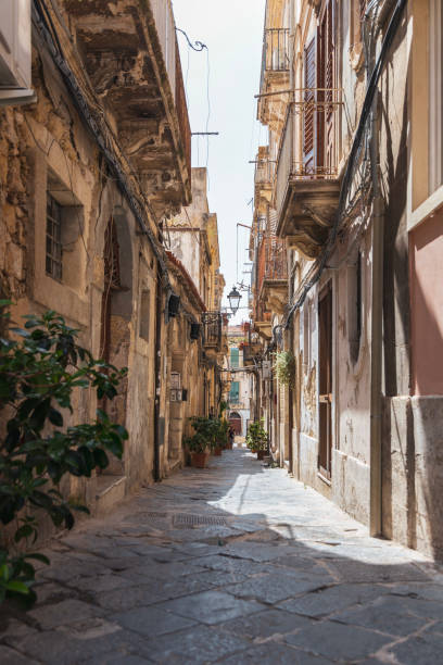 istock Empty narrow street in Syracuse, Sicily - Italy 1266280428