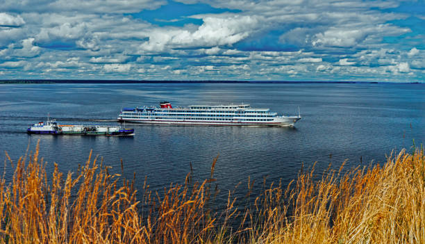 Rural landscape with ships floating down the river. concept tourism travel on holiday take a vacation time on summer.