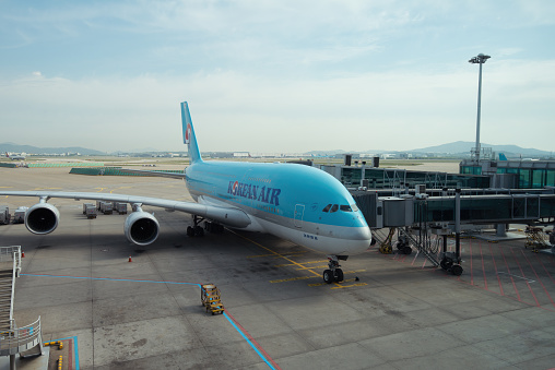 A Korean Air Airbus A380 parked at a gate at Incheon International Airport (ICN) in South Korea. Korean Air flies to 126 cities in 44 countries around the world and is the largest carrier in South Korea.