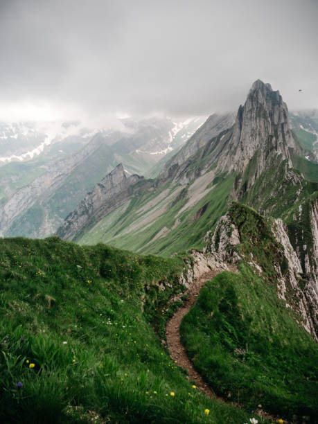 Rocky face mountain and mountain peaks in Appenzell, Switzerland