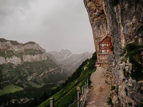 Dramatic landscape in Appenzell Canton, Switzerland 
Rocky Mountains and peaks with storm approaching