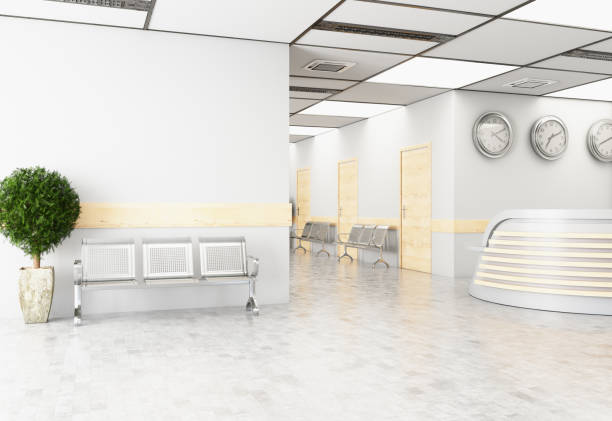 istock Empty Hospital Interior Waiting Room and Reception Desk 1266295803