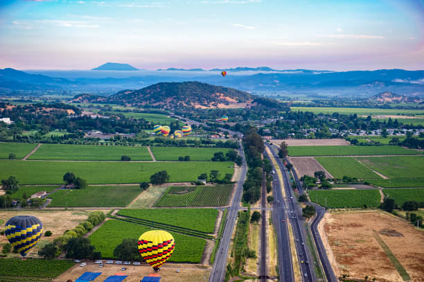 hot air ballooning over napa valley, ca - hot air balloon california napa napa valley imagens e fotografias de stock