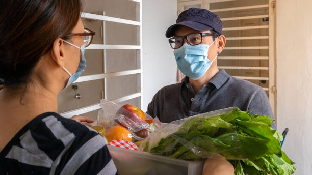 istock Delivering food ordered online during COVID-19 1266298960