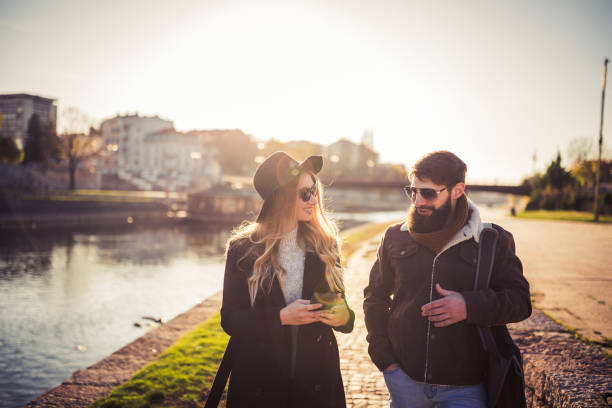 istock Friends walking by the river 1266300231