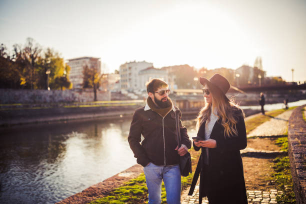 istock Friends enjoying a walk on a sunny autumn day 1266301677