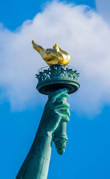 istock Golden torch of Liberty Statue 1266303905
