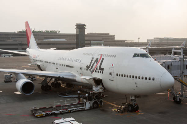 Japan Airlines Boeing 747-400 at Narita International Airport Japan Airlines Boeing 747-400 at Narita International Airport, Japan. Japan Airlines is an international airline and Japan's flag carrier narita japan stock pictures, royalty-free photos & images