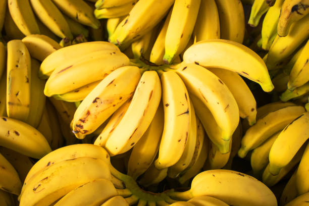 istock Fresh Natural Bananas at Market 1266304446