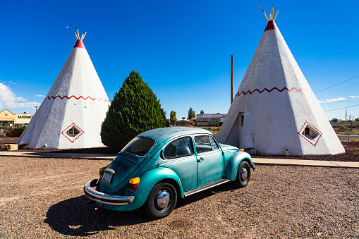 Holbrook, Arizona USA - October 29, 2016: The Wigwam Motel with its tepee style rooms and vintage cars is a popular tourist destination in this small desert town near the Petrified Forest.