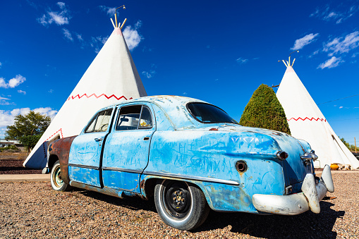 Holbrook, Arizona USA - October 29, 2016: The Wigwam Motel with its tepee style rooms and vintage cars is a popular tourist destination in this small desert town near the Petrified Forest.