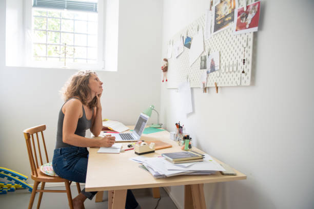 istock Young woman working from home 1266311350
