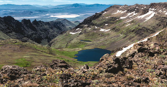 Wildhorse Lake is located at the bottom of a deep glacial cirque 1,100 feet below the summit of Steens Mountain.  Steens Mountain is almost 10,000 feet in elevation.