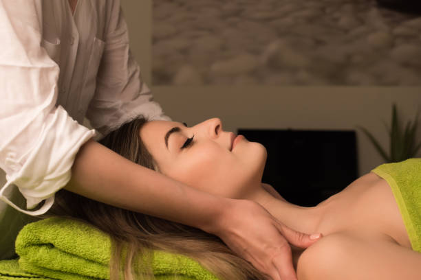 istock Woman having facial massage 1266312344